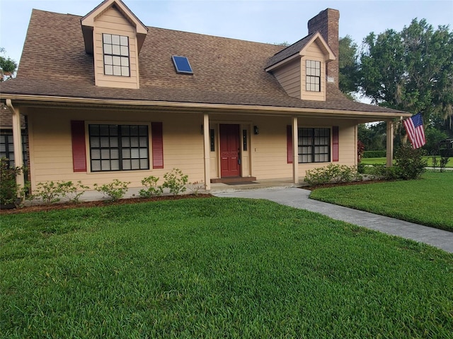 2615 Southern Oaks Pl, Plant City, FL 33566 - view of front of home featuring a front lawn, a chimney, covered porch, and roof with shingles