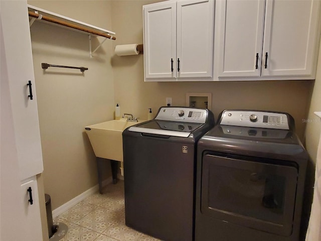 2615 Southern Oaks Pl, Plant City, FL 33566 - washroom with separate washer and dryer, cabinet space, baseboards, and light flooring