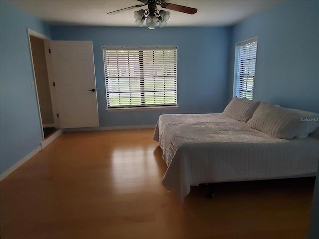 2615 Southern Oaks Pl, Plant City, FL 33566 - bedroom with baseboards and a ceiling fan