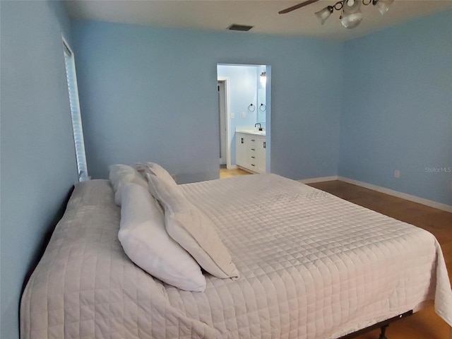 2615 Southern Oaks Pl, Plant City, FL 33566 - bedroom featuring a sink, a ceiling fan, and baseboards