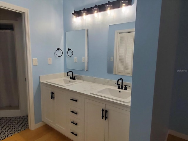 2615 Southern Oaks Pl, Plant City, FL 33566 - full bathroom featuring double vanity and baseboards