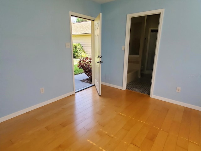 2615 Southern Oaks Pl, Plant City, FL 33566 - unfurnished room with wood finished floors and baseboards