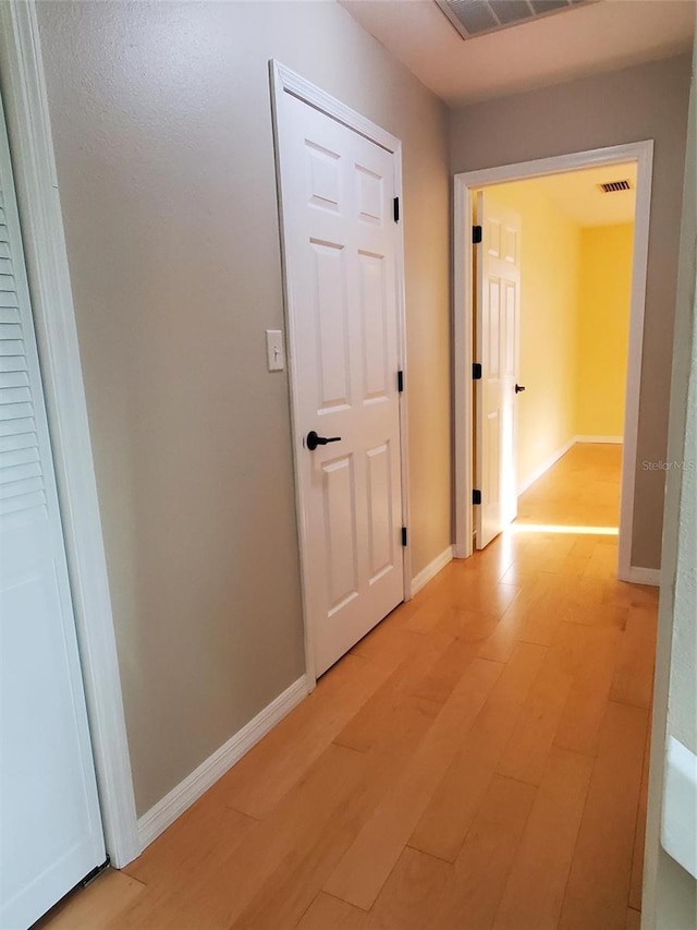 2615 Southern Oaks Pl, Plant City, FL 33566 - hallway with light wood-style flooring and baseboards