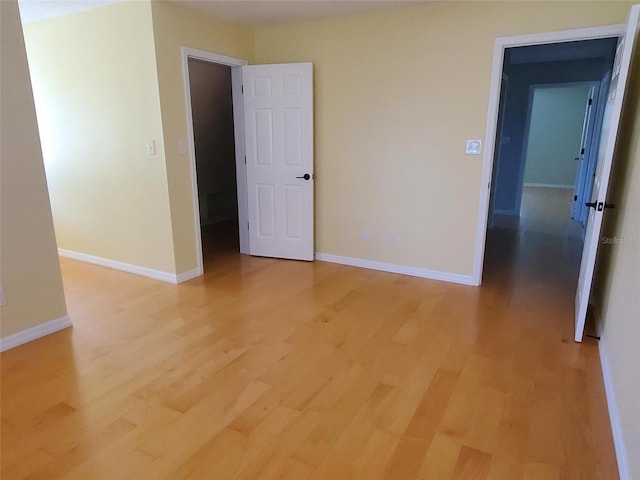 2615 Southern Oaks Pl, Plant City, FL 33566 - spare room with light wood-style flooring and baseboards