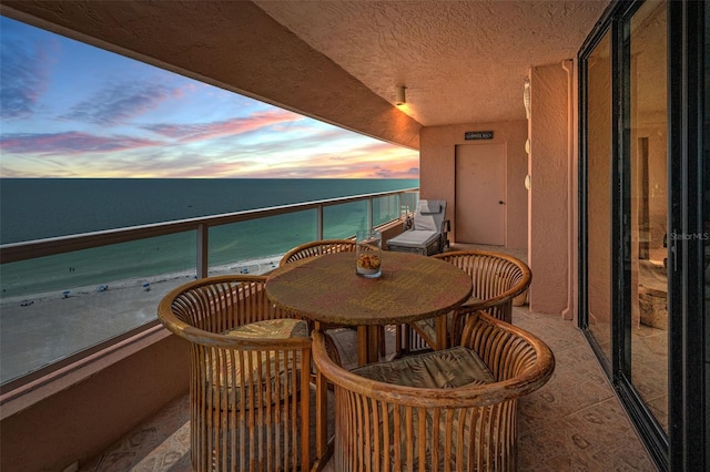1340 Gulf Blvd Unit 16A, Clearwater Beach, FL 33767 - balcony at dusk with a water view