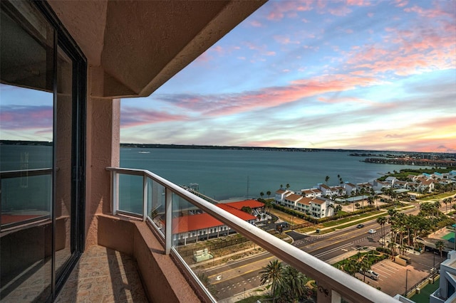 1340 Gulf Blvd Unit 16A, Clearwater Beach, FL 33767 - balcony at dusk with a water view