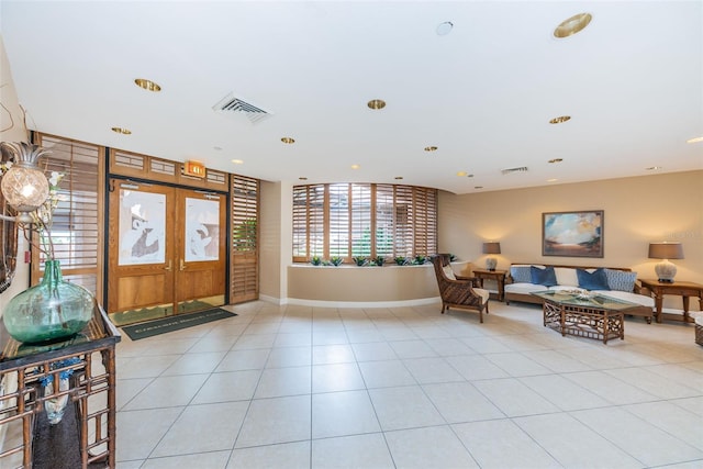 1340 Gulf Blvd Unit 16A, Clearwater Beach, FL 33767 - entrance foyer featuring baseboards, french doors, light tile patterned flooring, and recessed lighting