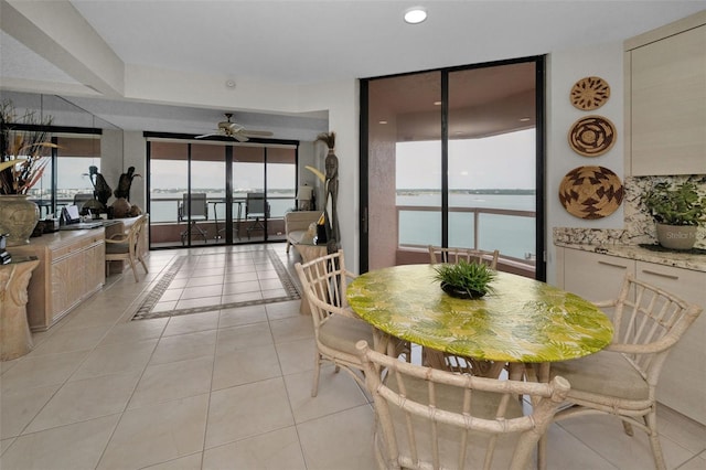 1340 Gulf Blvd Unit 16A, Clearwater Beach, FL 33767 - dining area featuring light tile patterned floors, ceiling fan, and recessed lighting