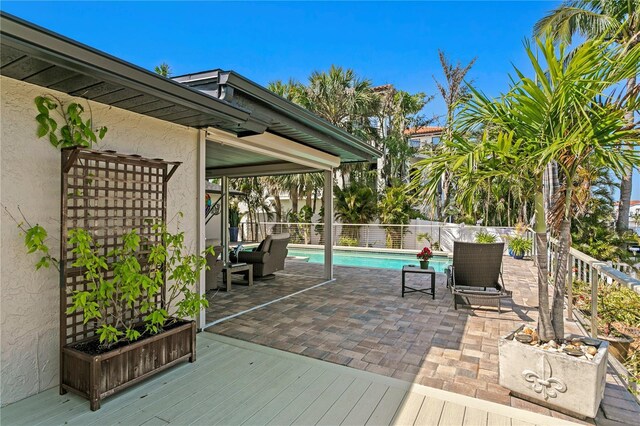 2817 Seabreeze Dr S, Gulfport, FL 33707 - wooden terrace with a fenced backyard and a patio area