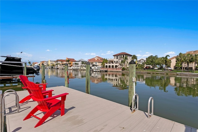 2817 Seabreeze Dr S, Gulfport, FL 33707 - dock featuring a water view and a residential view