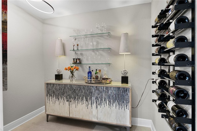 2817 Seabreeze Dr S, Gulfport, FL 33707 - wine area with a dry bar and baseboards