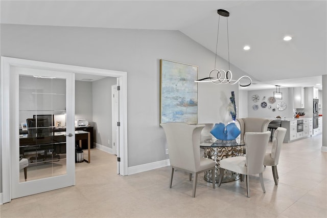 2817 Seabreeze Dr S, Gulfport, FL 33707 - dining area with vaulted ceiling, baseboards, a desk, and recessed lighting