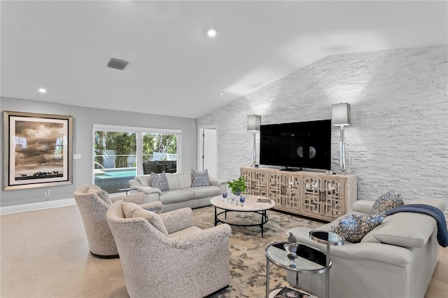 2817 Seabreeze Dr S, Gulfport, FL 33707 - living area featuring vaulted ceiling, baseboards, recessed lighting, and tile patterned floors