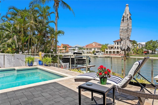 2817 Seabreeze Dr S, Gulfport, FL 33707 - view of pool with a patio area, a water view, and a boat dock