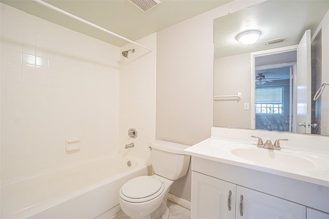 3002 W Cleveland St Unit C3, Tampa, FL 33609 - bathroom with toilet, vanity, tub / shower combination, and baseboards