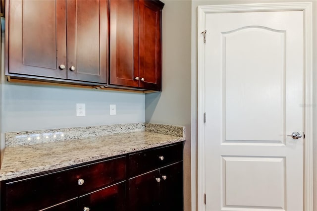 kitchen featuring light stone counters