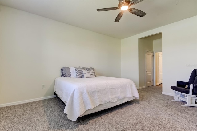 bedroom featuring carpet, baseboards, and ceiling fan
