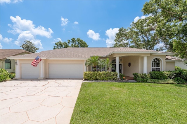 627 Belted Kingfisher Dr N, Palm Harbor, FL 34683 - ranch-style house with stucco siding, a garage, a front lawn, driveway, and a shingled roof