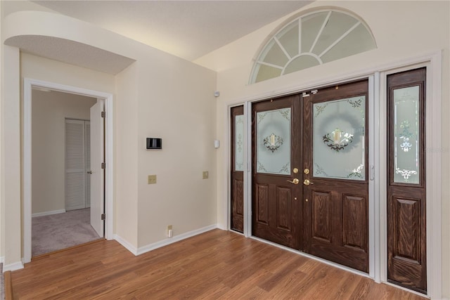 627 Belted Kingfisher Dr N, Palm Harbor, FL 34683 - entrance foyer with wood finished floors and baseboards