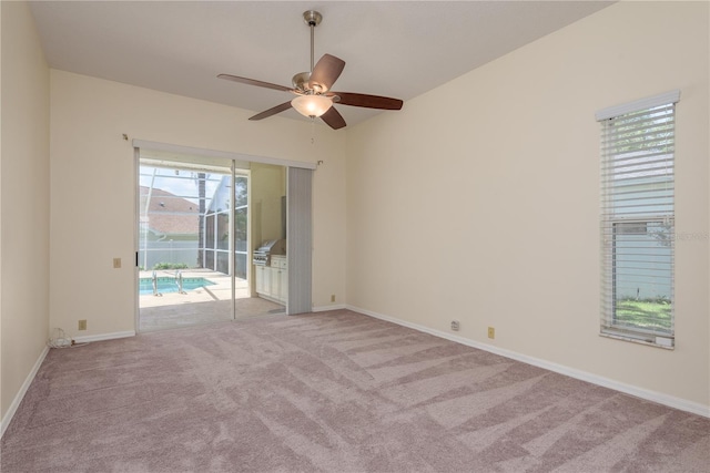 627 Belted Kingfisher Dr N, Palm Harbor, FL 34683 - carpeted empty room with ceiling fan and baseboards
