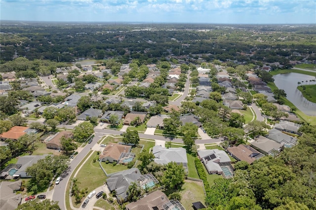 627 Belted Kingfisher Dr N, Palm Harbor, FL 34683 - aerial perspective of suburban area with a nearby body of water
