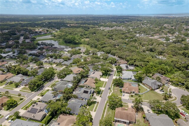 627 Belted Kingfisher Dr N, Palm Harbor, FL 34683 - aerial view of property and surrounding area featuring nearby suburban area and a nearby body of water