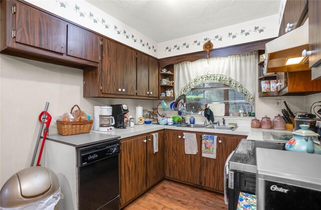 28 N Edinburgh Dr, Inverness, FL 34450 - kitchen featuring open shelves, black dishwasher, light countertops, light wood-style flooring, and range with electric stovetop