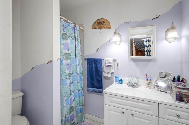 28 N Edinburgh Dr, Inverness, FL 34450 - full bathroom with toilet, vanity, and a shower with curtain