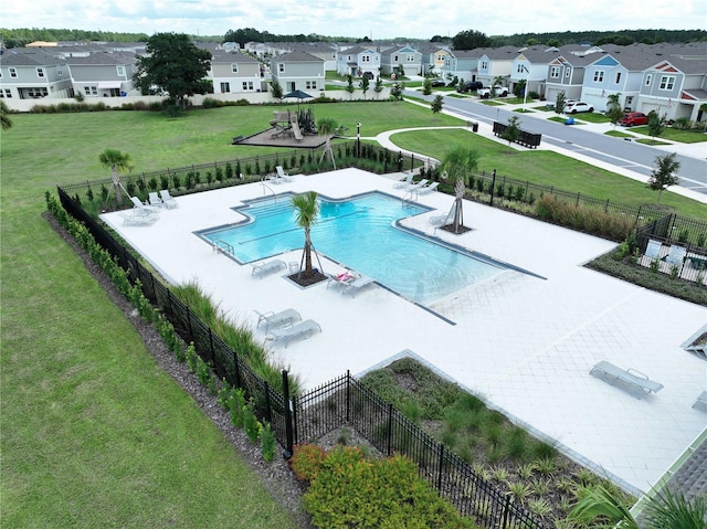 34056 Scarlet Sage Ct, Wesley Chapel, FL 33545 - community pool with a residential view and a patio area