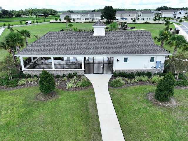34056 Scarlet Sage Ct, Wesley Chapel, FL 33545 - view of front of home with stucco siding, a shingled roof, and a residential view