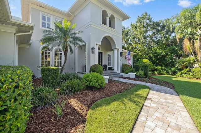 4512 Cheval Blvd, Lutz, FL 33558 - view of front of home with stucco siding and a front lawn