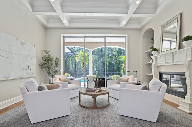 4512 Cheval Blvd, Lutz, FL 33558 - living room featuring a fireplace, coffered ceiling, beamed ceiling, crown molding, and wood finished floors