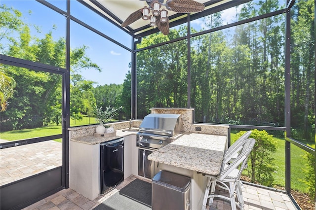 4512 Cheval Blvd, Lutz, FL 33558 - sunroom / solarium featuring area for grilling and ceiling fan