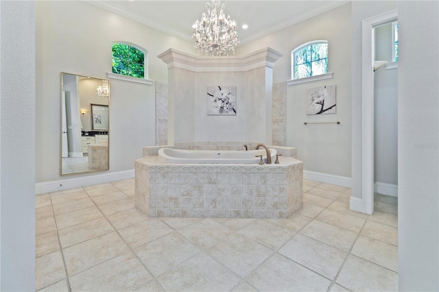 4512 Cheval Blvd, Lutz, FL 33558 - full bath with a chandelier, a garden tub, crown molding, and tile patterned flooring