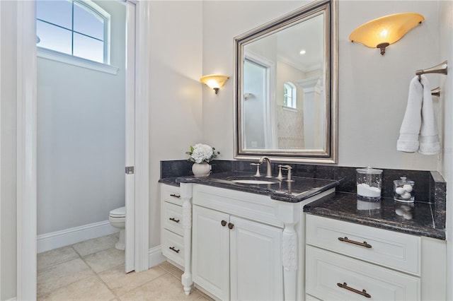4512 Cheval Blvd, Lutz, FL 33558 - full bath featuring healthy amount of natural light, toilet, vanity, and tile patterned flooring
