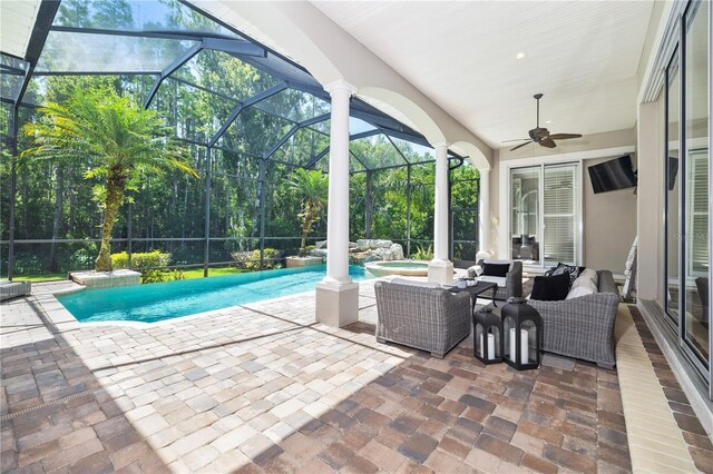 4512 Cheval Blvd, Lutz, FL 33558 - view of patio / terrace with an outdoor pool, glass enclosure, ceiling fan, and outdoor lounge area