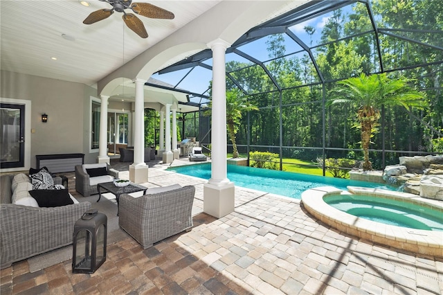 4512 Cheval Blvd, Lutz, FL 33558 - view of pool with an outdoor living space, a ceiling fan, a patio area, glass enclosure, and a pool with connected hot tub