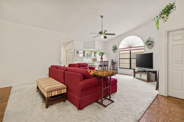 5434 Wellfield Rd, New Port Richey, FL 34655 - living area featuring a ceiling fan and a textured ceiling