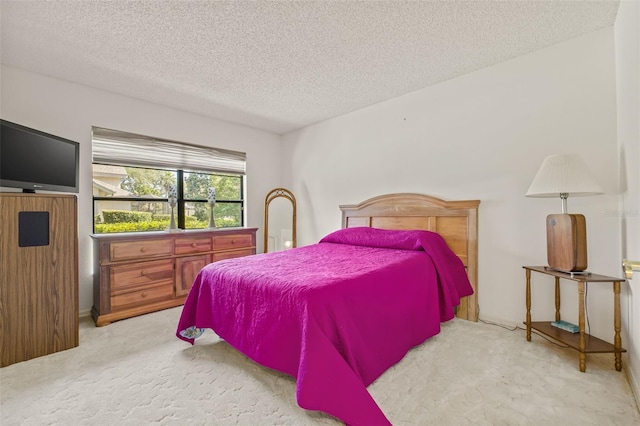 5434 Wellfield Rd, New Port Richey, FL 34655 - bedroom with carpet and a textured ceiling