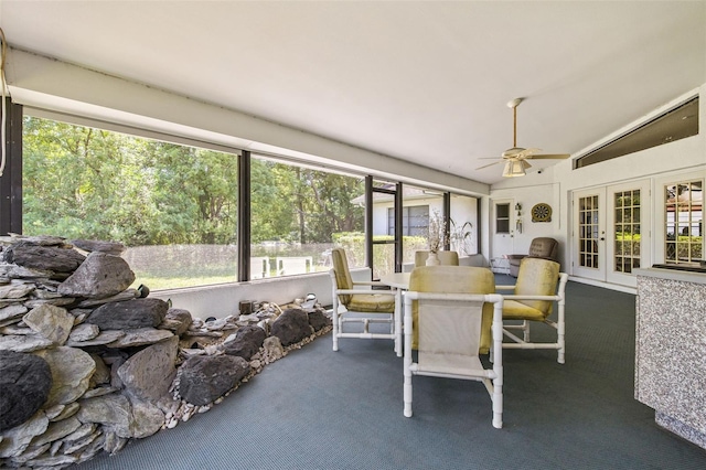 5434 Wellfield Rd, New Port Richey, FL 34655 - sunroom / solarium featuring french doors, ceiling fan, outdoor dining space, and lofted ceiling