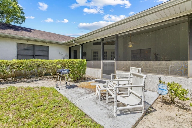 5434 Wellfield Rd, New Port Richey, FL 34655 - view of patio / terrace featuring grilling area and a sunroom