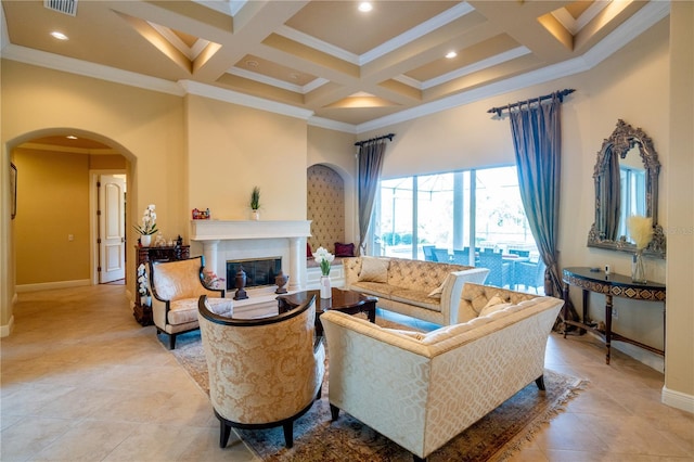 15101 Kestrelglen Way, Lithia, FL 33547 - living room with arched walkways, baseboards, coffered ceiling, ornamental molding, and light tile patterned flooring