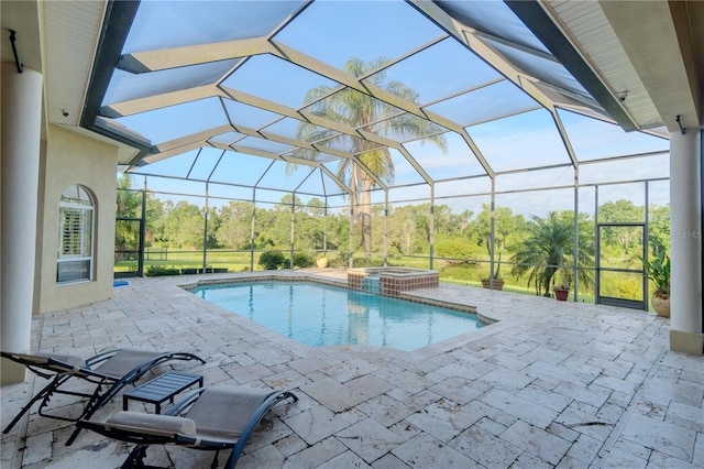 15101 Kestrelglen Way, Lithia, FL 33547 - view of swimming pool with a patio, a lanai, and a pool with connected hot tub