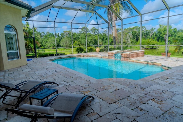 15101 Kestrelglen Way, Lithia, FL 33547 - view of pool with a patio, a lanai, a pool with connected hot tub, and view of scattered trees