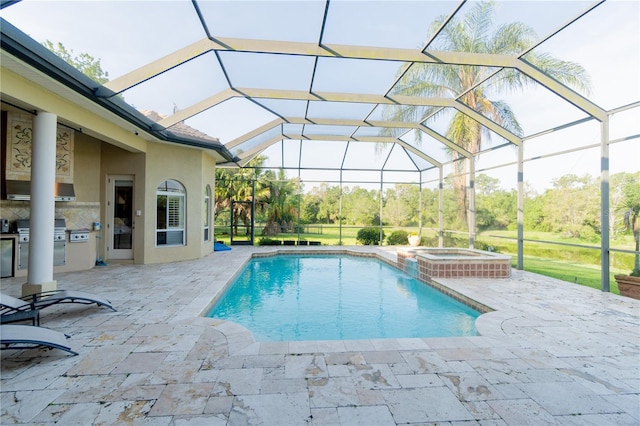 15101 Kestrelglen Way, Lithia, FL 33547 - view of pool with glass enclosure, a patio area, and a pool with connected hot tub