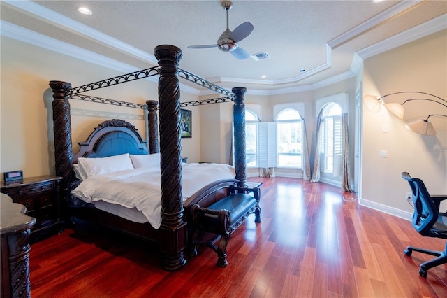 15101 Kestrelglen Way, Lithia, FL 33547 - bedroom featuring crown molding, baseboards, wood finished floors, recessed lighting, and a ceiling fan