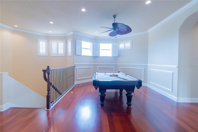 15101 Kestrelglen Way, Lithia, FL 33547 - game room featuring healthy amount of natural light, a wainscoted wall, wood finished floors, ceiling fan, and arched walkways