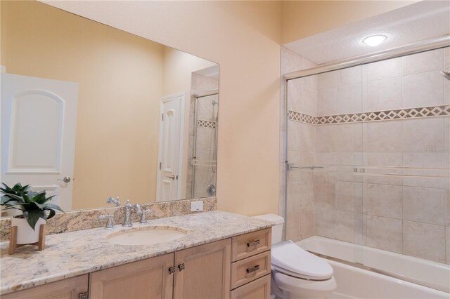 15101 Kestrelglen Way, Lithia, FL 33547 - bathroom featuring vanity, toilet, and shower / washtub combination