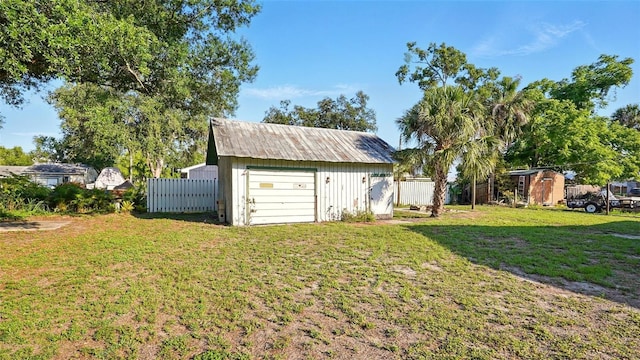 138 S Hernando Ave, Arcadia, FL 34266 - view of yard with an outbuilding and a garage