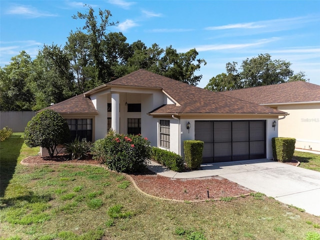 9200 Halberg Dr, Hudson, FL 34669 - ranch-style home featuring stucco siding, an attached garage, concrete driveway, a shingled roof, and a front yard
